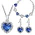 Coffret de sept paires de boucles d oreilles serties de cristaux Swarovski